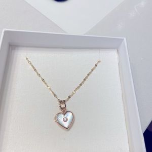 Melanie Auld Mother of Pearl Heart Locket on Chain brand new with box